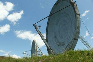 old and large disused radio antennas photo