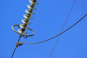 a close up of a power line with wires attached photo