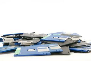 a pile of floppy disks photo