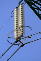 a close up of a power line with wires attached photo