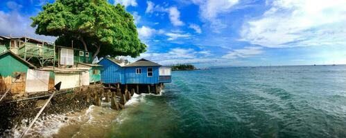 Lahaina Bay was photographed from a restaurant that is no longer there because the entire city was burned to the ground. photo