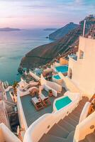 Peaceful evening view of Santorini island. Picturesque spring sunset on the famous vacation destination, Greece, Europe. Traveling concept background. Romantic sunset landscape, summer holiday photo