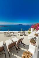 Luxury summer travel and vacation, loungers and swimming pool with white architecture. Tranquil view of summer resort or hotel. Fantastic summer mood, relaxing vibes photo