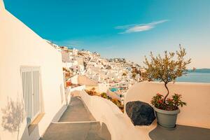 Amazing evening view of Fira, caldera, volcano of Santorini, Greece with cruise ships at sunset. Cloudy dramatic sky landscape, vertical panoramic banner. Beautiful summer sunset vacation scenery photo