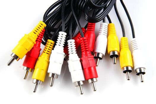 several different colored cables with different colored plugs photo
