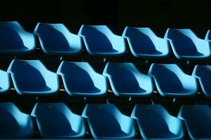 a row of blue chairs photo