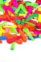 a pile of colorful plastic balloons photo