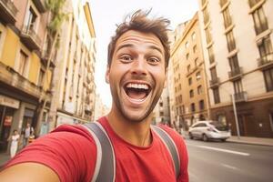 young man taking selfie in the streets photo