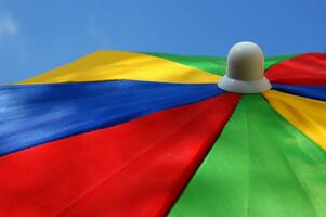 a close up of a colorful umbrella photo