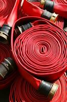 a close up of a red fire hose photo