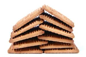 a pile of biscuits on a white background photo