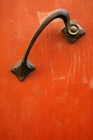 a lion head on a door handle photo