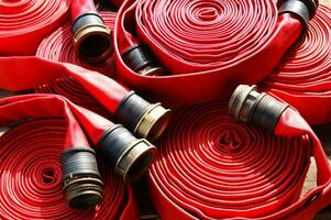 a close up of a red fire hose photo