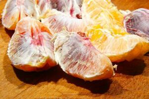 a table with a bunch of oranges on it photo