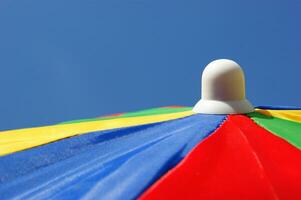 a close up of a colorful umbrella photo