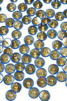 a pile of blue and gold buttons photo