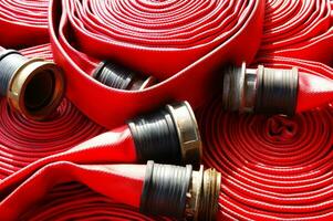 a close up of a red fire hose photo