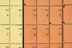 a row of yellow and orange lockers photo