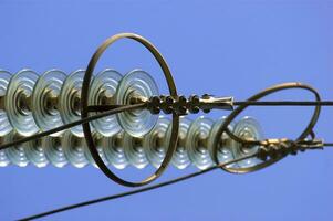 a close up of a power line with wires attached photo