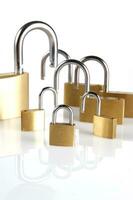 a lock with several locks and keys photo