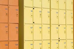 a row of yellow and orange lockers photo