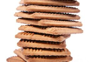 a pile of biscuits on a white background photo