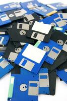 a pile of floppy disks photo