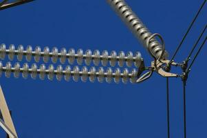 a close up of a power line with wires attached photo