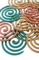 a group of colorful coasters with a spiral design photo
