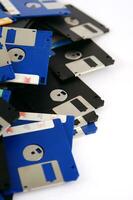 a pile of floppy disks photo