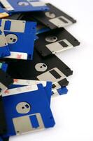 a pile of floppy disks photo