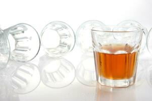 a group of glasses with different types of drinks photo