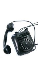 a black telephone on a white background photo