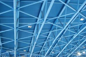 a blue ceiling with many lights photo