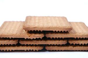 a pile of biscuits on a white background photo