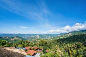 Beautiful mountain view and blue sky on doi sky at nan province.Nan is a rural province in northern Thailand bordering Laos photo