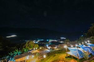 Camping under the million star at Sapan Village At nan Thailand.Sapan is Small and tranquil Village in the mountain. photo