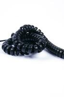 a black cord with a white background photo