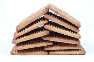 a pile of biscuits on a white background photo