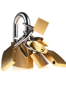 a lock with several locks and keys photo