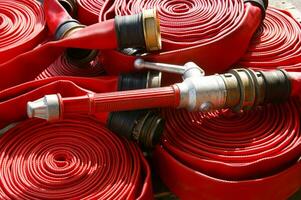 a close up of a red fire hose photo