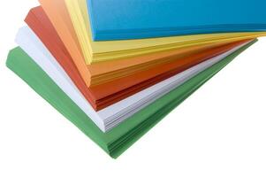 a stack of colored paper with a white background photo