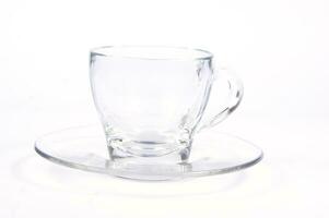 a glass cup with a tea bag in it photo