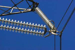 a close up of a power line with wires attached photo