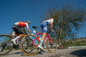 Bergamo Italy 2023 Giro di lombardia cyclists climbing the climb of the Zambla hill photo