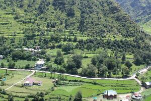 Beautiful day time view of Keran Valley, Neelam Valley, Kashmir. Green valleys, high mountains and trees are visible. photo