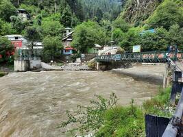 Beautiful view of Kutton waterfall, Neelum valley, Kashmir. Kutton waterfall is located in the lush green hills of Neelum Valley, Kashmir. photo