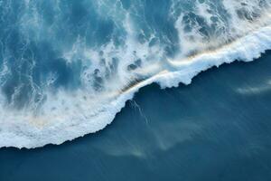 un aéreo ver de un ola rotura en el océano.drone foto fondo de mar ola en pájaro ojo ondas. generativo ai