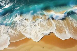 un aéreo ver de el Oceano olas en un arenoso playa. generativo ai foto