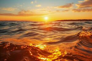 Golden sun sinking into tranquil ocean background with empty space for text photo